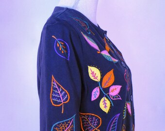 A Michael Simon "Lite" cotton jacket with leave appliques across the top and down the sleeves in vibrant neon colors