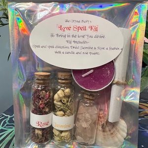 May include: A love spell kit with dried jasmine and rose petals, a feather, a seashell, a candle, and rose quartz crystals. The kit includes instructions for a love spell.