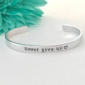 Never give up , inspirational cuff bracelet inspirational stamped message  - Hand stamped Bracelet , friend, working hard, graduate, gift