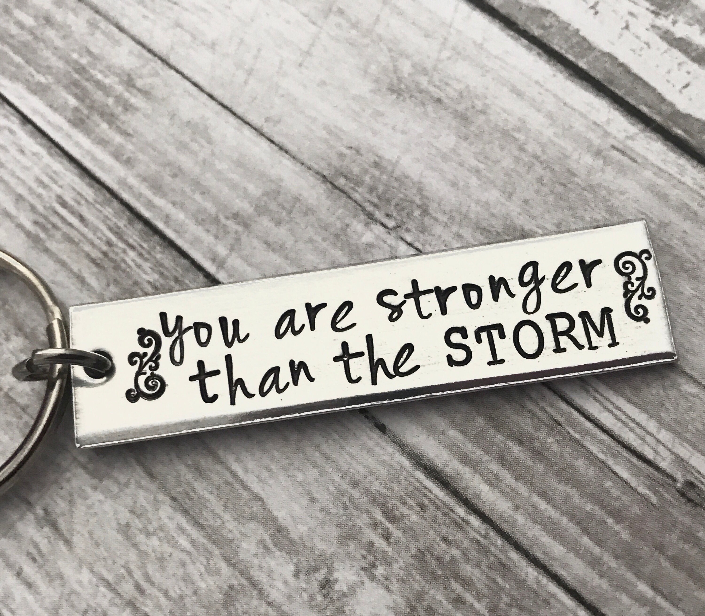 You are stronger than the storm   -  inspiration  keychain - you will get through this - hang in there - thiss too shall pass - great gift