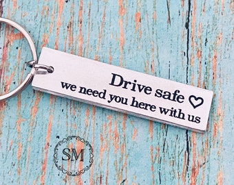 Drive safe, we need you here with us (with heart) keychain - drive safe - travel - driver - trip - loved one - special gift - traveler -