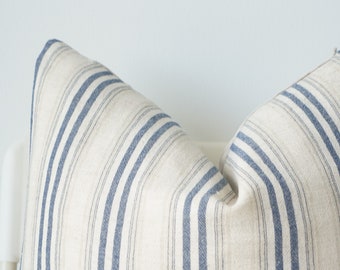 Housse de coussin blanc crème rayé bleu