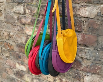 Round handbag made of genuine leather in many colors