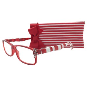 May include: Red eyeglasses with a candy cane design on the arms and a matching red and white striped case. The glasses have a decorative candy cane charm on the frame. The case is red and white striped with a red bow.