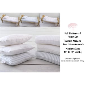 May include: A set of doll-sized mattress and pillows in white and blue striped fabric. The mattress and pillows are custom made to your measurements and are available in sizes from 10 to 12 inches wide.  Small and large sizes are also available in a separate listing.
