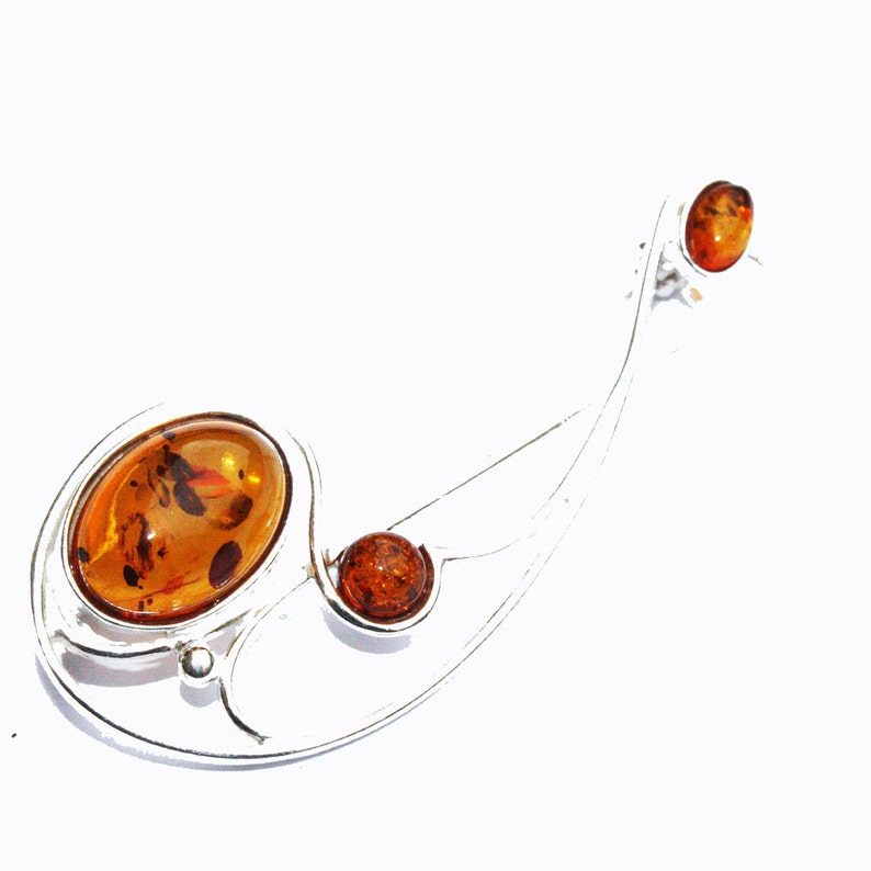 Graceful Amber Brooch containing three amber pieces set in a swirl of sterling amber accessory amber pin silver 925 amber jewellery