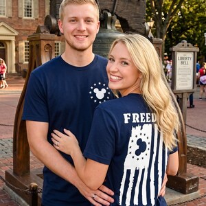 Disney Mickey Freedom patriotic theme park family vacation shirts, american flag hidden mouse distressed t-shirt, liberty square inspired couples matching apparel, freedom flag mouse ears fourth of july tee, magical kingdom patriotic american flag shirt, patriotic mouse head star circle graphic top, vintage style usa flag theme park clothing, matching couples patriotic vacation t-shirts, american pride freedom shirt, independence day magical vacation matching tees, united states flag mouse