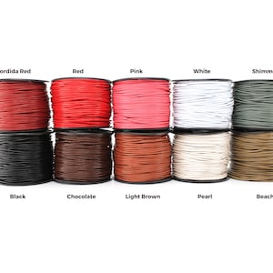 May include: Ten spools of leather cord in various colors, including Corrida Red, Red, Pink, White, Shimmer, Black, Chocolate, Light Brown, Pearl, and Beach.