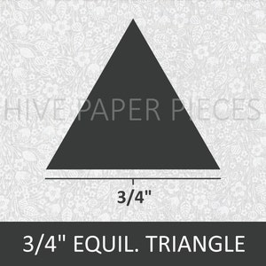 May include: A black equilateral triangle with a side length of 3/4 inches. The triangle is on a white background with a floral pattern.