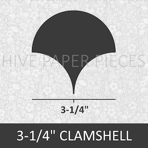 Puede incluir: Una forma de troquelado de concha negra con una medida de 3-1/4 pulgadas. El troquelado está sobre un fondo blanco con un patrón floral.