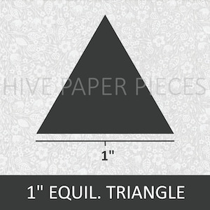 May include: A black 1-inch equilateral triangle on a white background with a floral pattern. The triangle is labeled "1" inch.