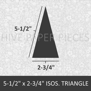 May include: A black isosceles triangle with measurements of 5-1/2 inches by 2-3/4 inches. The triangle is on a white background with a floral pattern.