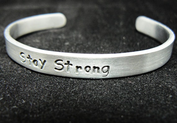 Items similar to hand stamped bracelet Stay Strong custom order on Etsy