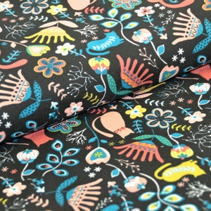 May include: Black fabric with a repeating pattern of stylized flowers, leaves, and cats in pink, blue, yellow, and red.