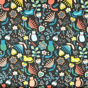 May include: A black fabric with a repeating pattern of stylized flowers, leaves, and cats. The cats are in various shades of blue, green, and pink. The flowers are in shades of pink, red, and yellow. The leaves are in shades of green and blue.