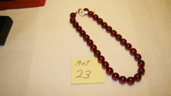 Ant #23 Cherry Amber Necklace