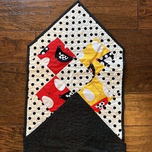 May include: A set of three ceramic mugs with a speckled, matte finish. The mugs are in shades of cream, light gray, and dark gray. Each mug has a simple, modern design and a rounded handle. Perfect for coffee or tea.