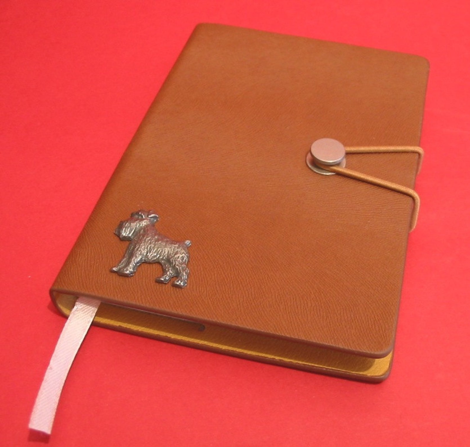 Jane s notebook is than mine