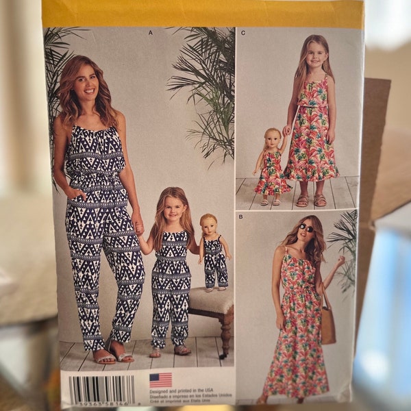 Simplicity 8146 Mom, daughter and doll,  adorable jumpsuit and dress pattern. Size 3-8 in child’s size and XS- XL in  Adult size.