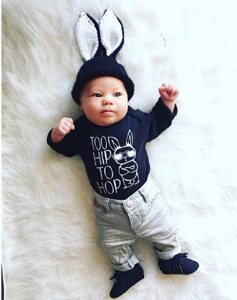 Black boy easter bodysuit adorned with a funny graphic featuring a bunny wearing sunglasses and text saying too hip to hop