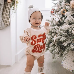 Girls Santa Face Romper with Confetti Dot Ruffles by Millie Jay