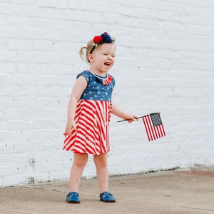 Ollie Jay Girls Lara Poplin Twirl Dress - Patriotic Bows for Fourth of July