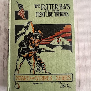May include: Vintage book titled "The Potter Boys in the Front Line Trenches" from the "Stars and Stripes Series." The cover features a soldier illustration, an American flag, and text in black and orange on a green background.