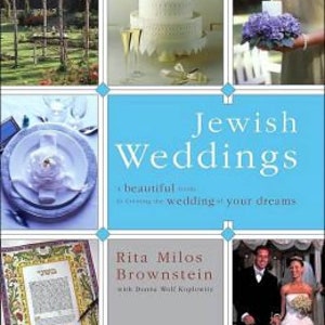 May include: A book cover with the title "Jewish Weddings: A beautiful guide to creating the wedding of your dreams" by Rita Milos Brownstein with Dara Wolf Kogosow. The cover features images of a wedding ceremony, a cake, a bouquet of flowers, a table setting, a ketubah, and a couple.