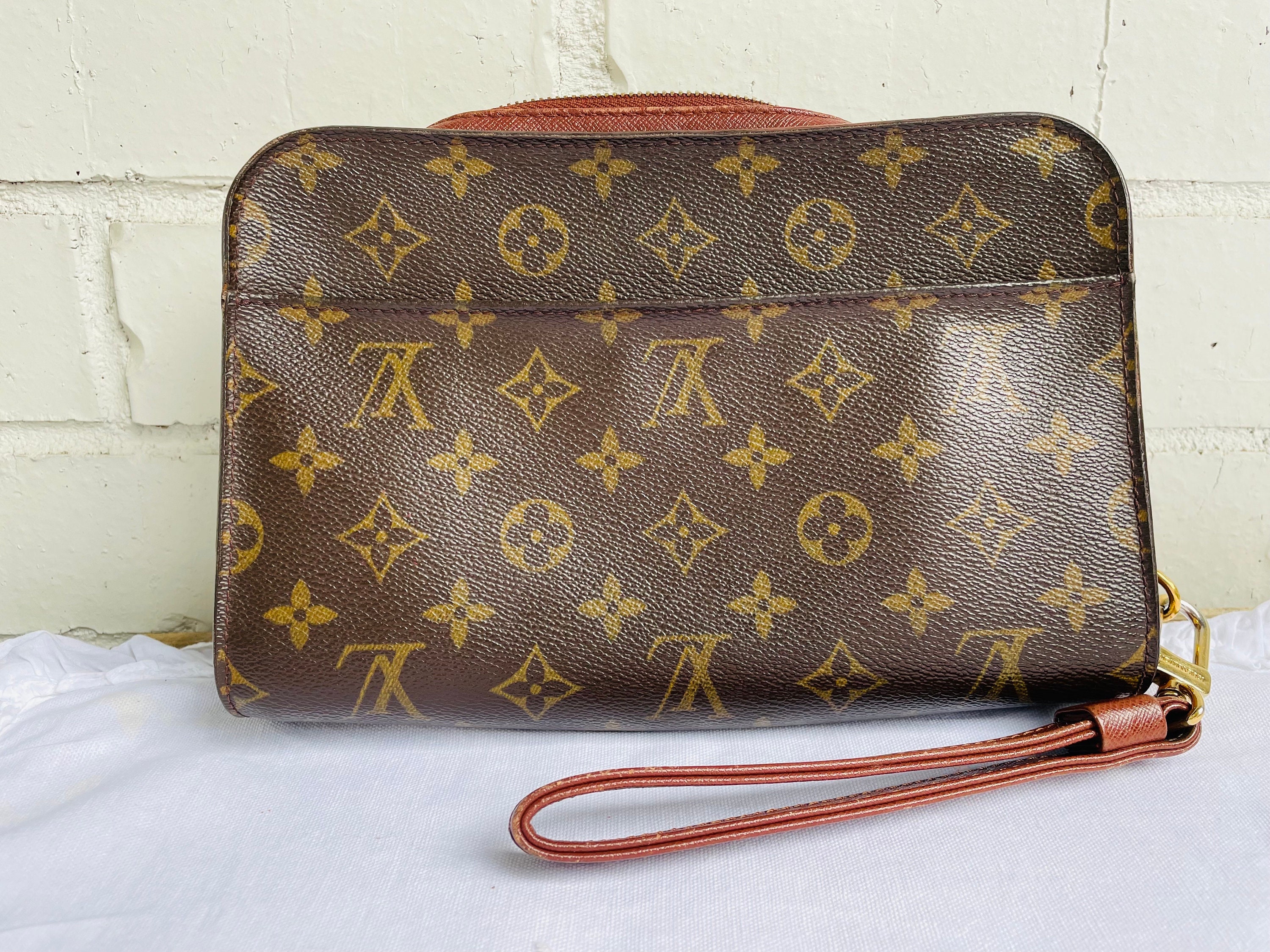 Louis vuitton orsay wristlet hotsell