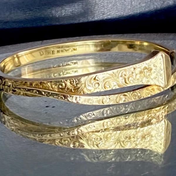 14kt gold, Iconic 1908 nail bracelet made by Fritzsche and Co. Engraved with pat. July 28, 1908.