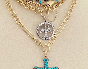 A 14kt SOLID gold trombone link  chain with charm connector