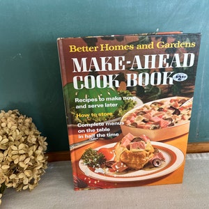 May include: A vintage Better Homes and Gardens cookbook titled "Make-Ahead Cook Book" with a price tag of $2.40. The cover features a photo of a casserole dish with a creamy, meaty dish and a close-up of a pastry with a flaky crust.