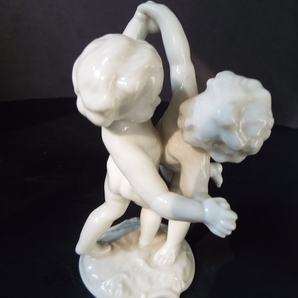 Hutschenreuther Tutter selb Kunstabteilung  German porcelain 2 cherub figurine wrestling  dancing cherub angel figurine putti figurine