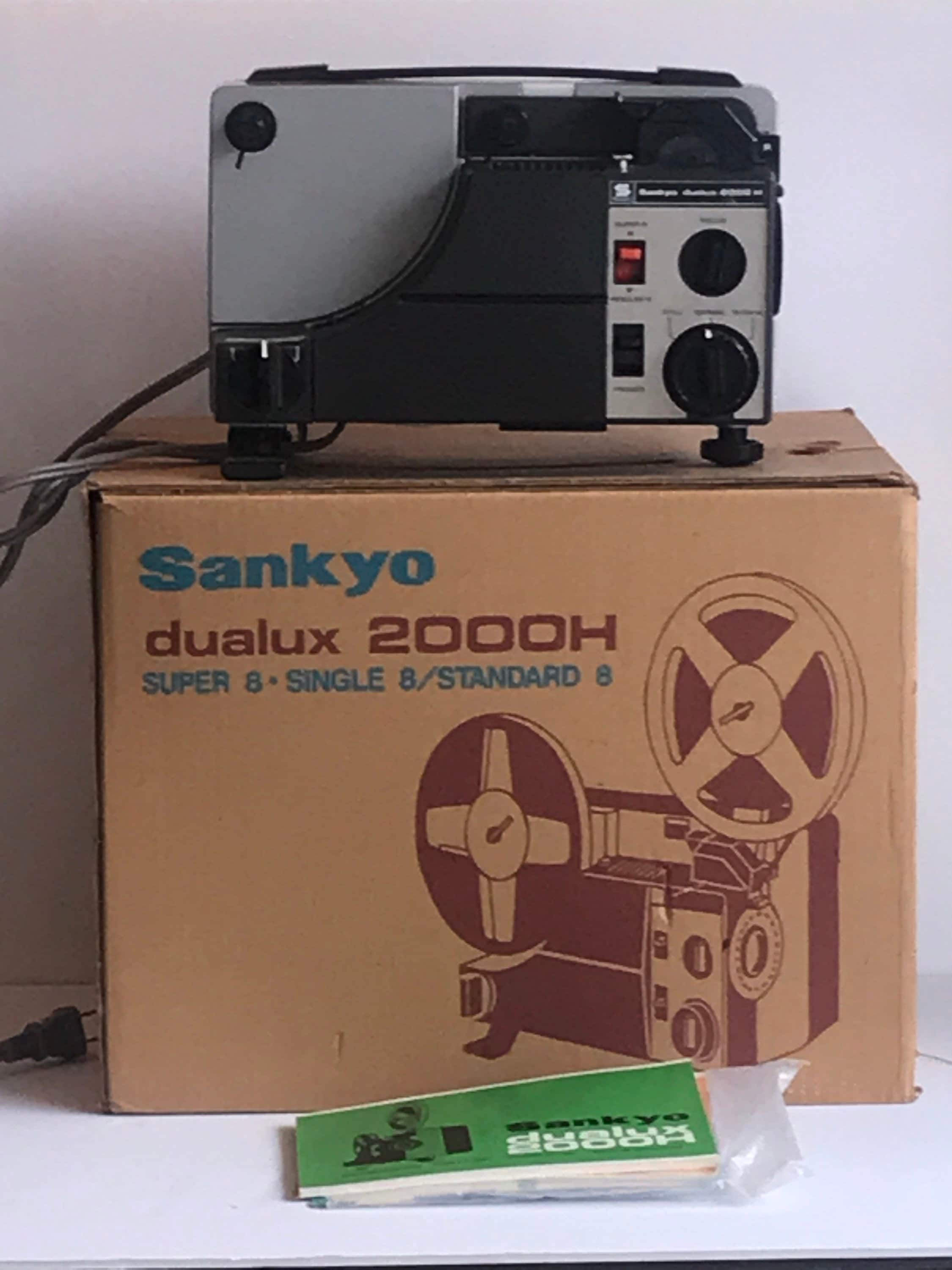 Projecteur film Dual 8 et Super8 mm EUMIG MARK 610 D - Courroie a remplacer