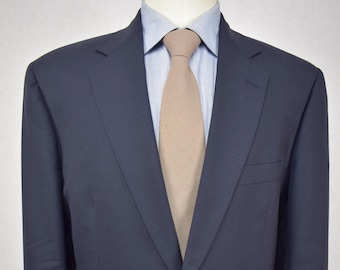 Traje de dos piezas de lana azul marino liso de Southwick con dos botones. Talla: 44S