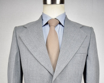 1970's Nino Cerruti Solid Light Gray Wool Two Button Three Piece Suit Size: 36R