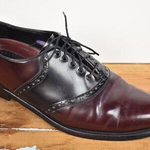 burgundy and black saddle oxfords