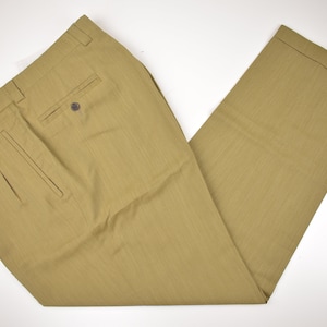 May include: A pair of khaki-coloured trousers with pleats at the front and a single back pocket. The trousers are made from a lightweight fabric and have a relaxed fit.