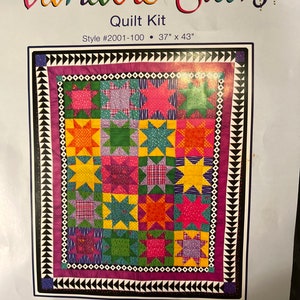 Könnte beinhalten: Ein Quilt-Set namens "Variable Stars" mit einem farbenfrohen Patchwork-Design mit Sternen. Das Set enthält alles, was Sie benötigen, außer Garn und Füllwatte. Der Quilt ist 94 cm x 109 cm groß.