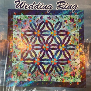 Patrón de edredón de piezas de papel de base de anillo de bodas de diamantes de Judy Niemeyer de Quiltworx.