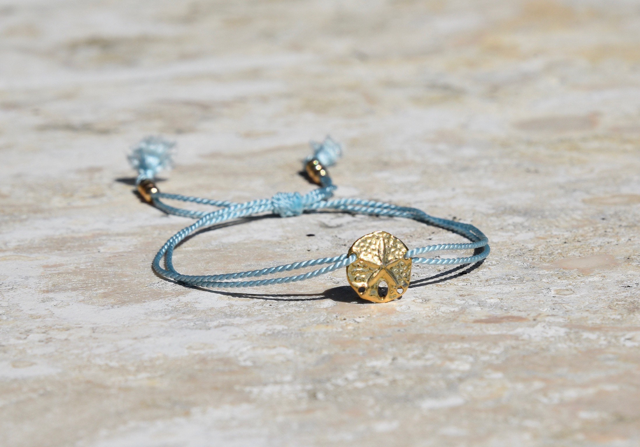 Silver sand dollar bracelet hotsell