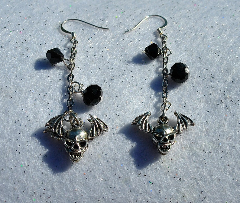 Silver Biker Earrings with Winged Skulls and black crystals Etsy
