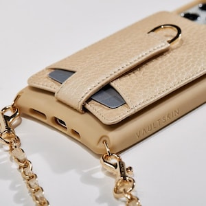 Vaultskin VICTORIA. Etui et portefeuille en cuir véritable. Pour iPhone 13 Pro, peut contenir jusqu'à 9 cartes, espèce et petits objets.