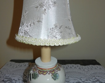 White Demask Clip-on Mini Shade, has a Lace Edging and a white fabric lining. Shade ONLY