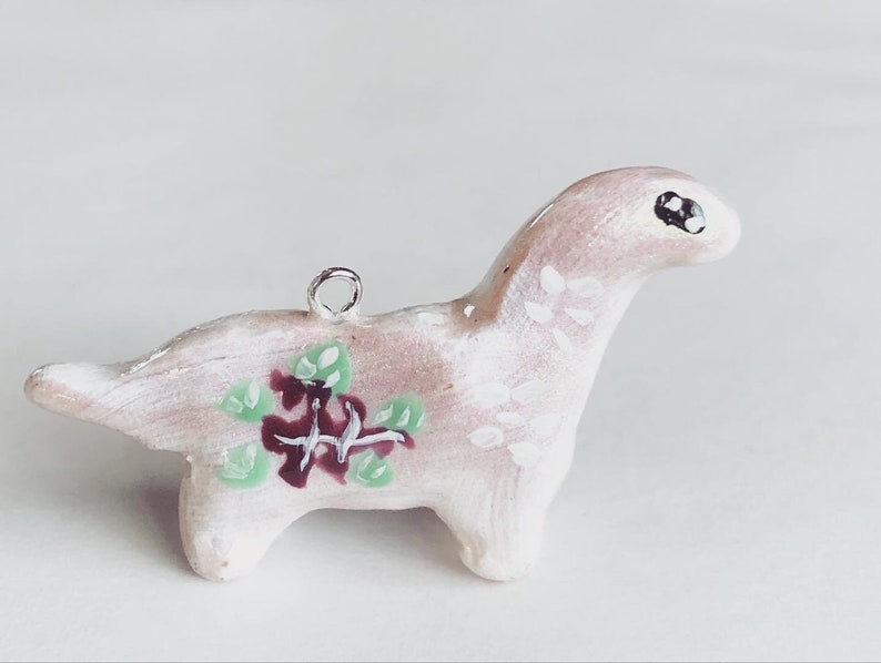 Polymer Clay Brachiosaurus Charm with painted Flowers Option to have inserted on Stainless Steel Necklace or keychain!