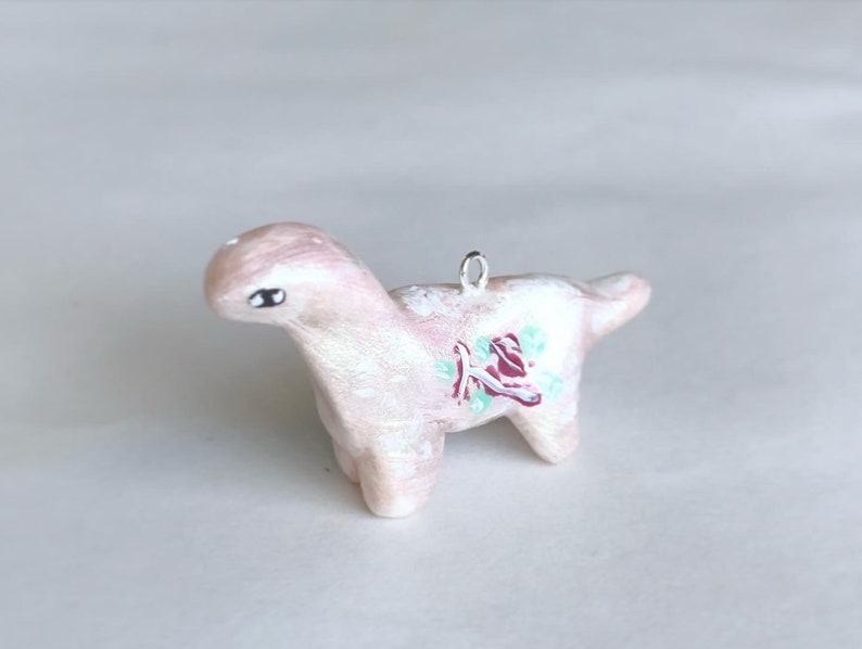 Polymer Clay Brachiosaurus Charm with painted Flowers Option to have inserted on Stainless Steel Necklace or keychain!