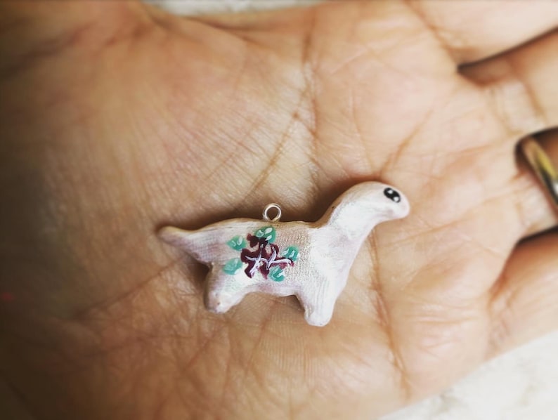 Polymer Clay Brachiosaurus Charm with painted Flowers Option to have inserted on Stainless Steel Necklace or keychain!