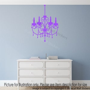 May include: Purple chandelier wall decal. The decal is shown on a light blue wall above a white dresser.