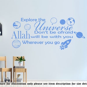 May include: Blue wall decal with the text "Explore the Universe Don't be afraid Allah will be with you Wherever you go" and images of planets and a rocket ship.