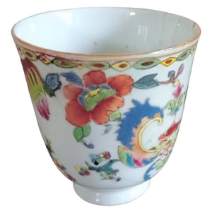 antique hand-painted Chinese ceramic cup dating back to the Qing Dynasty